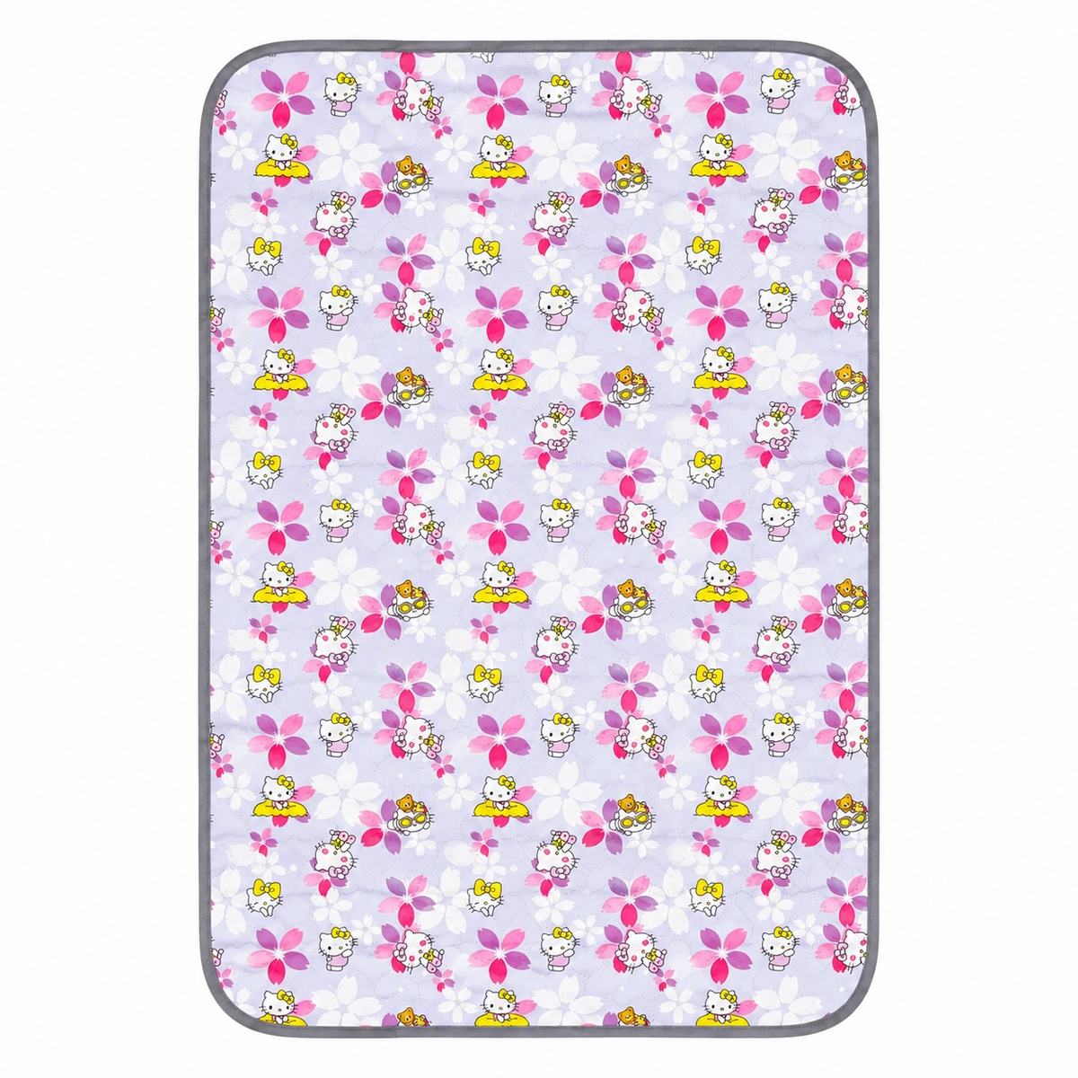 A rectangular mat with rounded corners featuring a repeating Hello Kitty pattern on a light lavender background. The pattern includes pink flowers, white blossoms, and Hello Kitty characters in yellow, pink, and white.