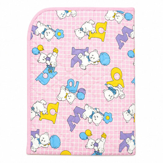 A square pink baby blanket or quilt featuring a cute cartoon polar bear pattern with colorful letters and balloons on a pink gingham background.