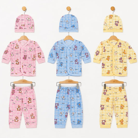 Six baby clothing sets displayed on wooden hangers against a white background, including three pink, three blue, and three yellow outfits with matching hats. Each set features a grid pattern with cartoon teddy bears and animals.