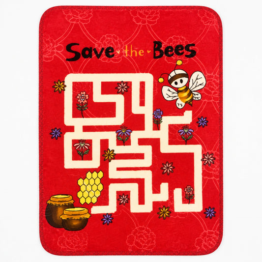 A red rectangular mat or rug with rounded corners featuring a colorful bee maze design and the words 'Save the Bees' at the top.