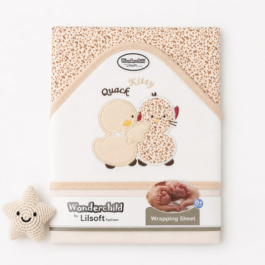 Wonderchild by Lilsoft kitten-themed wrapping sheet with a beige and brown spotted pattern, featuring embroidered cartoon kittens, on a white background with a small crochet star toy.