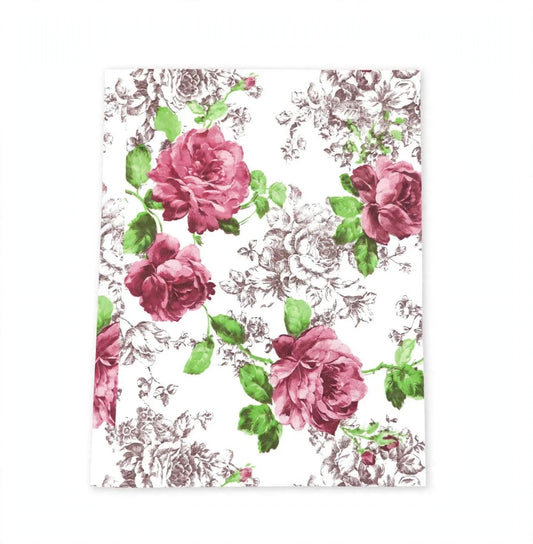 A rectangular notebook or journal with a white cover featuring a vintage floral pattern of pink roses and green leaves over a delicate gray toile-style background.